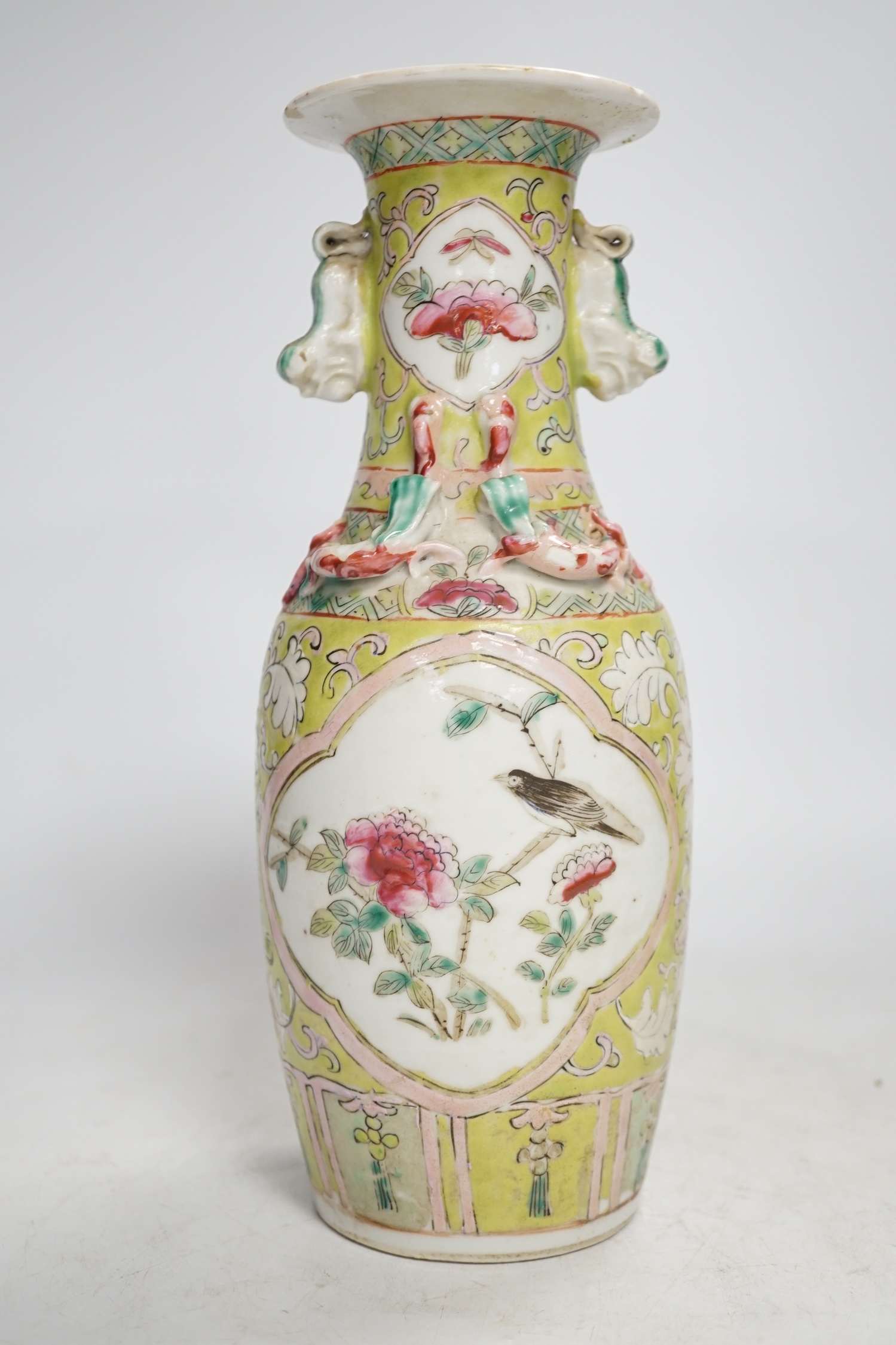 A 19th century Chinese vase, for the Malaysian Straits market, 25cm high. Condition - some minor chips to neck lip, fair